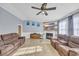 Bright living room featuring a fireplace and comfy seating at 8586 Edgewood Dr., Myrtle Beach, SC 29588
