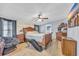Spacious main bedroom with large bed, dresser, and accent chair at 8586 Edgewood Dr., Myrtle Beach, SC 29588