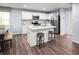 Modern kitchen with white cabinets, granite countertops, and island at 1092 Oak Meadow Dr., Conway, SC 29526