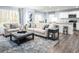 Spacious living room featuring neutral-toned couches and a large rug at 1092 Oak Meadow Dr., Conway, SC 29526