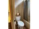 Clean bathroom with toilet, shower, and tile floor at 610 14Th Ave. S # 181, Surfside Beach, SC 29575