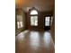 Bright living room with tile floors and a door leading outside at 610 14Th Ave. S # 181, Surfside Beach, SC 29575