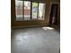 Spacious bedroom with tile floors and large window at 610 14Th Ave. S # 181, Surfside Beach, SC 29575