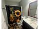 Bathroom with sunflower shower curtain and a vanity at 3456 Macklen Rd. # 18-B, Myrtle Beach, SC 29588