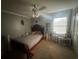 Spacious bedroom with a queen bed and large window at 3456 Macklen Rd. # 18-B, Myrtle Beach, SC 29588