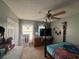 Bright bedroom featuring a double bed, dresser and ceiling fan at 3456 Macklen Rd. # 18-B, Myrtle Beach, SC 29588