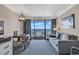 Living room with ocean view and comfortable seating at 1105 Ocean Blvd. S # 412, Myrtle Beach, SC 29577