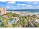 Relaxing pool area with ocean views and palm trees at 1105 Ocean Blvd. S # 412, Myrtle Beach, SC 29577