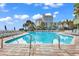 Inviting outdoor pool with plenty of lounge chairs at 1105 Ocean Blvd. S # 412, Myrtle Beach, SC 29577