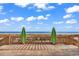 Beach access with boardwalk and surfboard decor at 1105 Ocean Blvd. S # 412, Myrtle Beach, SC 29577