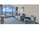 Living room with ocean view and comfortable seating at 1105 Ocean Blvd. S # 412, Myrtle Beach, SC 29577