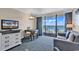 Living room with ocean view and comfortable seating at 1105 Ocean Blvd. S # 412, Myrtle Beach, SC 29577