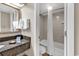Bathroom with granite countertop, single sink and shower/tub combo at 1105 Ocean Blvd. S # 412, Myrtle Beach, SC 29577