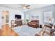 Spacious living room with hardwood floors and leather sofas at 911 Ocean Pines Ct., North Myrtle Beach, SC 29582