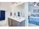 Double vanity bathroom with a shower and view of bedroom at 911 Ocean Pines Ct., North Myrtle Beach, SC 29582