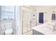 Clean bathroom, featuring a shower and double vanity at 911 Ocean Pines Ct., North Myrtle Beach, SC 29582