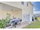 Outdoor shower and patio area with grill at 911 Ocean Pines Ct., North Myrtle Beach, SC 29582