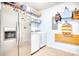 Bright laundry room with washer, dryer, and refrigerator at 911 Ocean Pines Ct., North Myrtle Beach, SC 29582