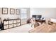 Home office with a desk, multiple computer monitors and plenty of storage at 911 Ocean Pines Ct., North Myrtle Beach, SC 29582