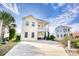 Two-story home with a driveway and charming exterior at 911 Ocean Pines Ct., North Myrtle Beach, SC 29582