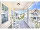 Relaxing front porch with rocking chairs, overlooking the neighborhood at 911 Ocean Pines Ct., North Myrtle Beach, SC 29582