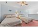 Bedroom with two twin beds and ceiling fan at 215 Double Eagle Dr. # G-2, Myrtle Beach, SC 29575
