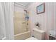 Bathroom with tub, shower, and striped wall at 215 Double Eagle Dr. # G-2, Myrtle Beach, SC 29575