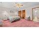 Main bedroom with coastal decor, ceiling fan and carpeting at 215 Double Eagle Dr. # G-2, Myrtle Beach, SC 29575