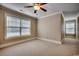 Large bonus room with gray vinyl plank flooring and a ceiling fan at 1642 Portwest Dr., Myrtle Beach, SC 29579