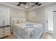 Cozy bedroom with full-size bed and private access to porch at 6001 S Kings Hwy., Myrtle Beach, SC 29575
