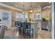 Island kitchen features granite counters and stainless steel appliances at 6001 S Kings Hwy., Myrtle Beach, SC 29575
