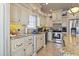 Spacious kitchen with granite countertops and custom cabinetry at 6001 S Kings Hwy., Myrtle Beach, SC 29575