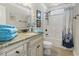 Clean bathroom with tub, granite countertop vanity at 6001 S Kings Hwy., Myrtle Beach, SC 29575