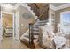 Open staircase with metal railings leading to the upper level at 6001 S Kings Hwy., Myrtle Beach, SC 29575