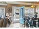 Bright kitchen with teal door leading to outdoor space at 6001 S Kings Hwy., Myrtle Beach, SC 29575