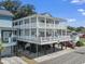 Two story house with large deck and parking at 6001 S Kings Hwy., Myrtle Beach, SC 29575