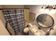 Updated bathroom features granite vanity, a shower/tub combo, and stylish fixtures at 10166 Beach Dr. # 5306, Calabash, NC 28467
