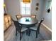 Dining area with round table and four chairs at 10166 Beach Dr. # 5306, Calabash, NC 28467