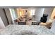 Kitchen with granite countertops and breakfast bar overlooking living room at 10166 Beach Dr. # 5306, Calabash, NC 28467