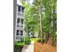 A walkway winds through a lush, wooded area, showcasing the community's natural beauty at 10166 Beach Dr. # 5306, Calabash, NC 28467