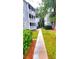 Well-maintained walkway leading to apartment buildings at 10166 Beach Dr. # 5306, Calabash, NC 28467