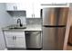 Modern kitchen with stainless steel appliances and granite countertops at 10166 Beach Dr. # 5306, Calabash, NC 28467