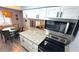 Updated kitchen featuring granite countertops and stainless steel appliances at 10166 Beach Dr. # 5306, Calabash, NC 28467
