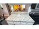 Kitchen with granite countertop and view into living room at 10166 Beach Dr. # 5306, Calabash, NC 28467