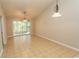 Spacious dining area with tile floors and sliding glass doors to a deck at 3681 Claypond Rd. # 3107, Myrtle Beach, SC 29579