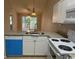 White kitchen cabinets, granite counters, and stainless steel appliances at 3681 Claypond Rd. # 3107, Myrtle Beach, SC 29579