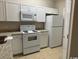 Modern kitchen with white cabinets and granite countertops at 3681 Claypond Rd. # 3107, Myrtle Beach, SC 29579