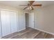 Bedroom with double-door closet and ceiling fan at 3681 Claypond Rd. # 3107, Myrtle Beach, SC 29579