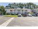 Two-story building with ample parking and landscaping at 3681 Claypond Rd. # 3107, Myrtle Beach, SC 29579