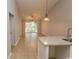 Open kitchen with granite countertops and breakfast bar at 3681 Claypond Rd. # 3107, Myrtle Beach, SC 29579